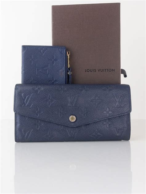 curieuse flap louis vuitton|louis vuitton embossed wallet.